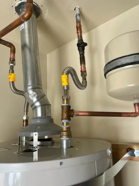 Water heater installation and plumbing repair in Tecumseh
